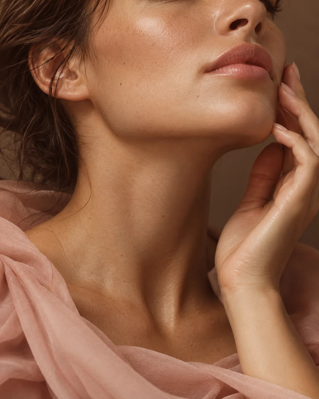 Editorial close-up of natural skin in warm light